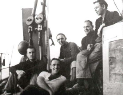 Photograph Chico's wartime crew, with Lewis gun in background